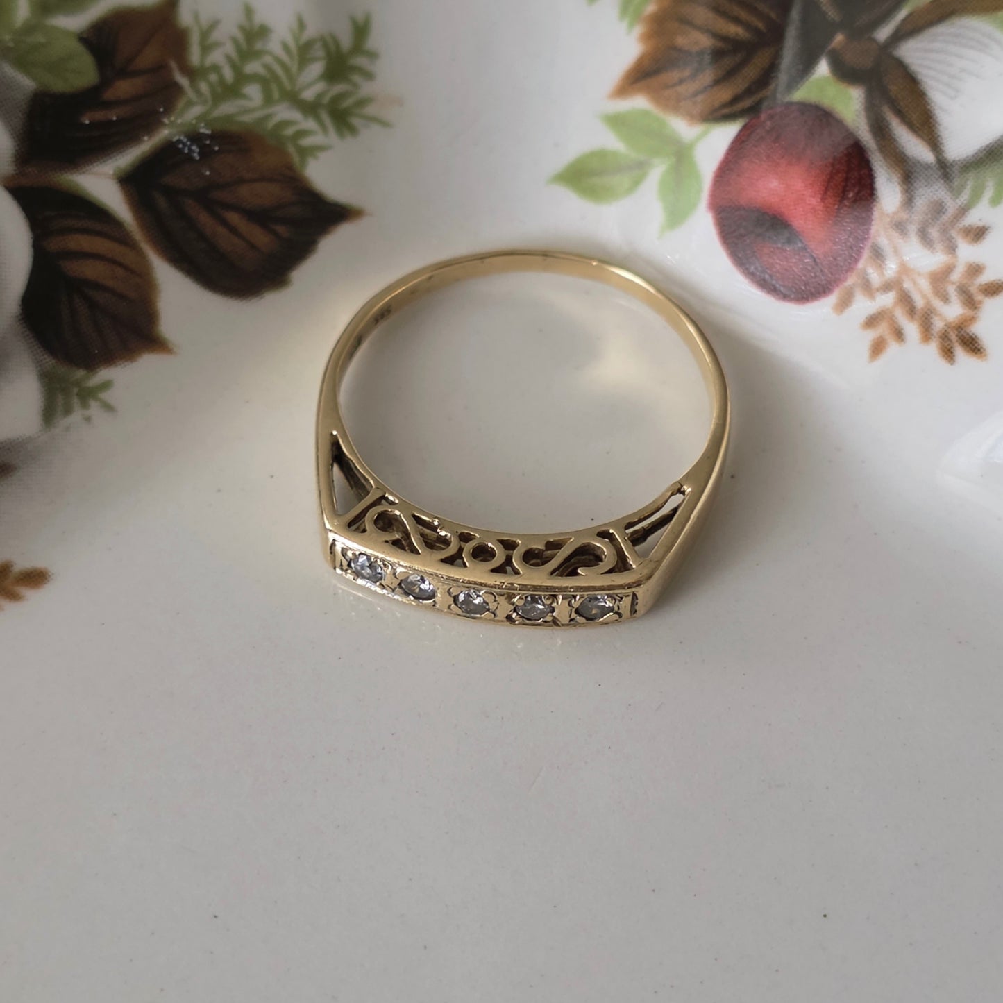 Vintage 14k gouden ring met diamanten en krullen
