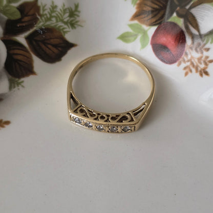 Vintage 14k gouden ring met diamanten en krullen
