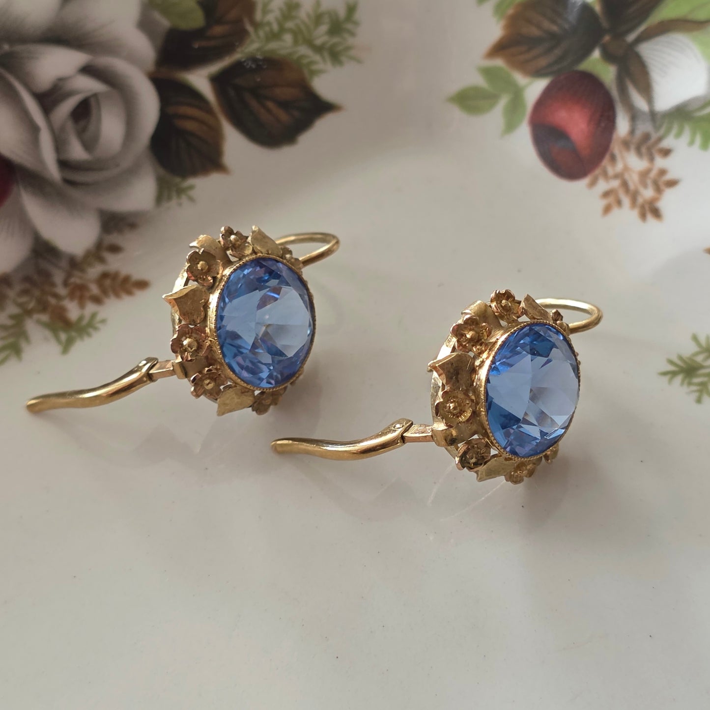 Vintage 14k gold earrings with topaz and flower details