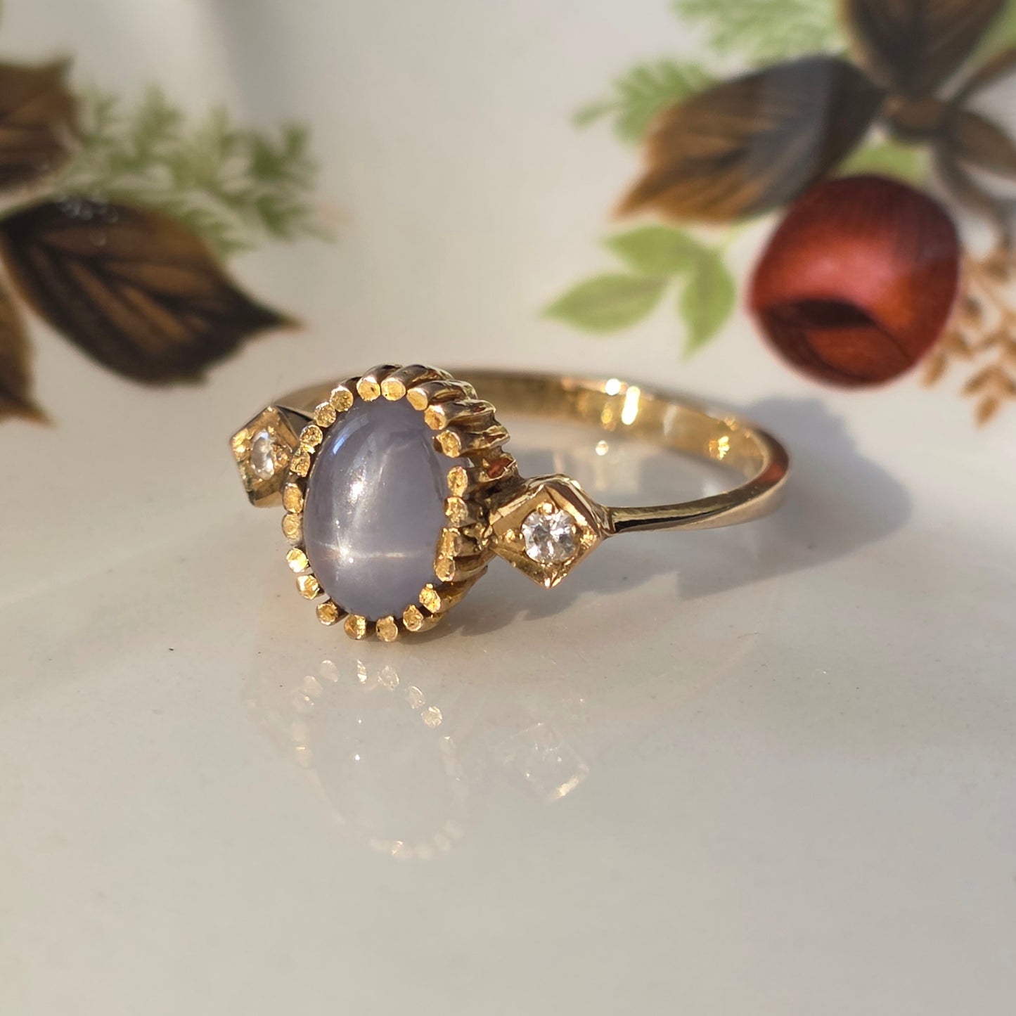 Vintage 14k gouden ring met ster saffier en diamanten
