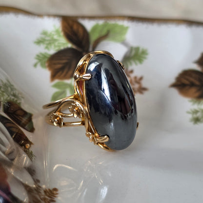 Vintage 14k gouden ring met hematiet en bloemen
