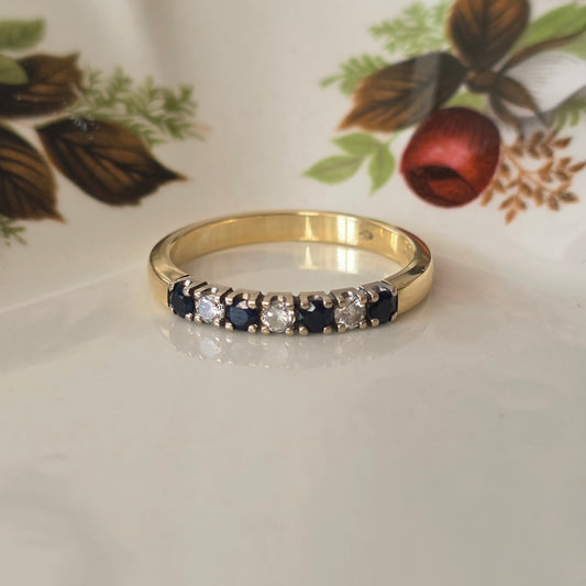 Vintage 14k gouden ring met saffier en diamant 0.12ct