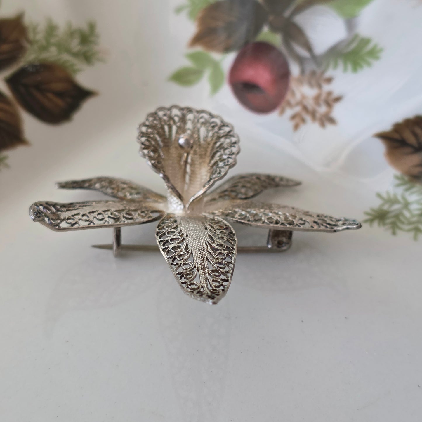 Antique silver filigree orchid brooch