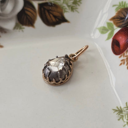 Antique 14k gold and silver pendant with a pear-shaped rose-cut diamond